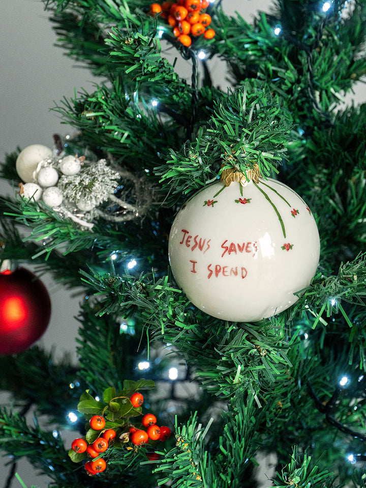 "Jesus Saves I Spend" Christmas Ornament